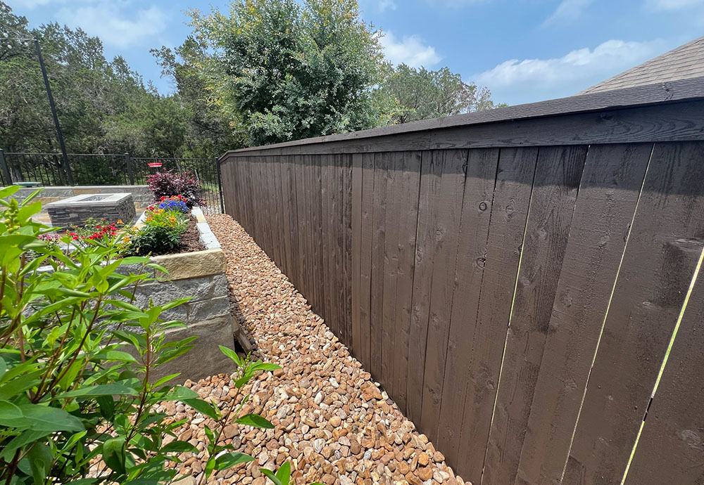 a newly stained fence