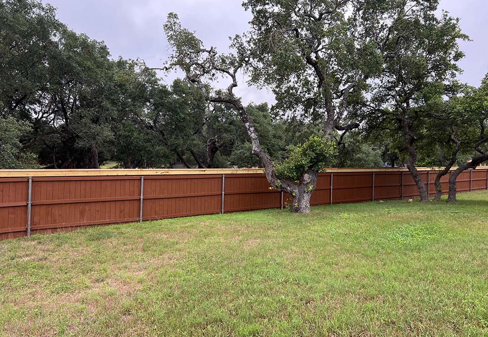 a newly stained fence